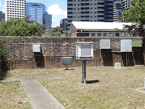 A wall built behind the Stevenson Screen at Sydney Observatory. Photo.