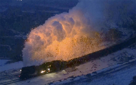 Chinese coal train, burning coal in glorious display of fossil fuels.